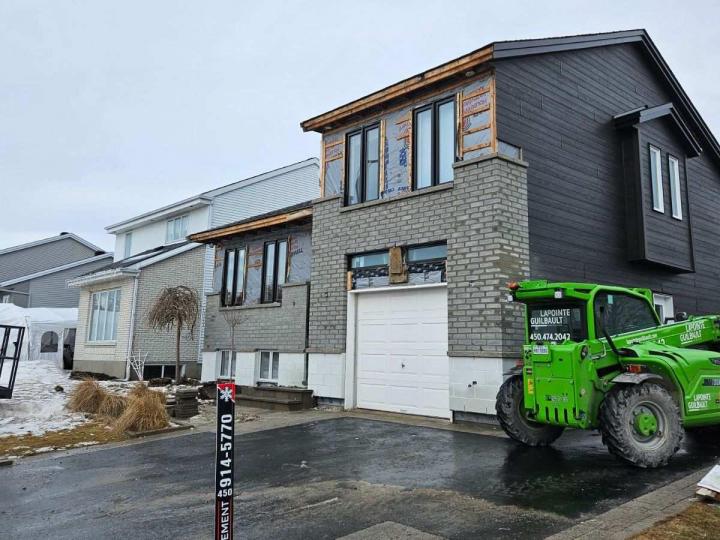 Pose collée de brique et pierres Québec