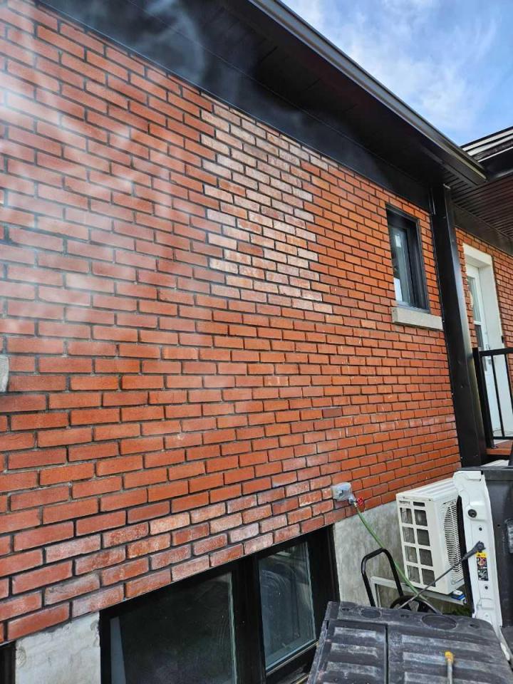 Pose collée de brique et pierres Québec 