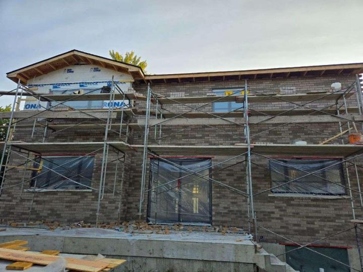 Pose collée de brique et pierres Québec